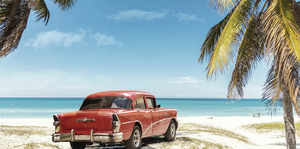 old red american car on Varadero Beach in Cuba
