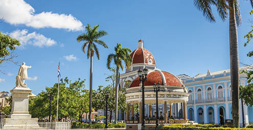 Cienfuegos Jose Marti central park with palms and historical buildings, Cienfuegos Province, Cuba