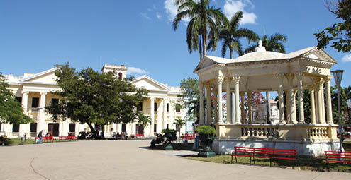 Main Square in Santa Clara, Cuba. Palm trees.