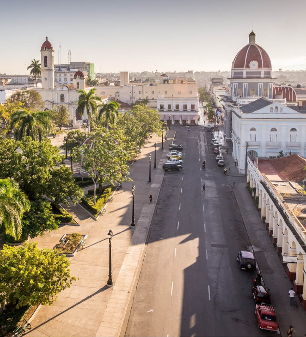 View on Jose Marti park with town hall and cathedral in Cienfuegos, Cuba